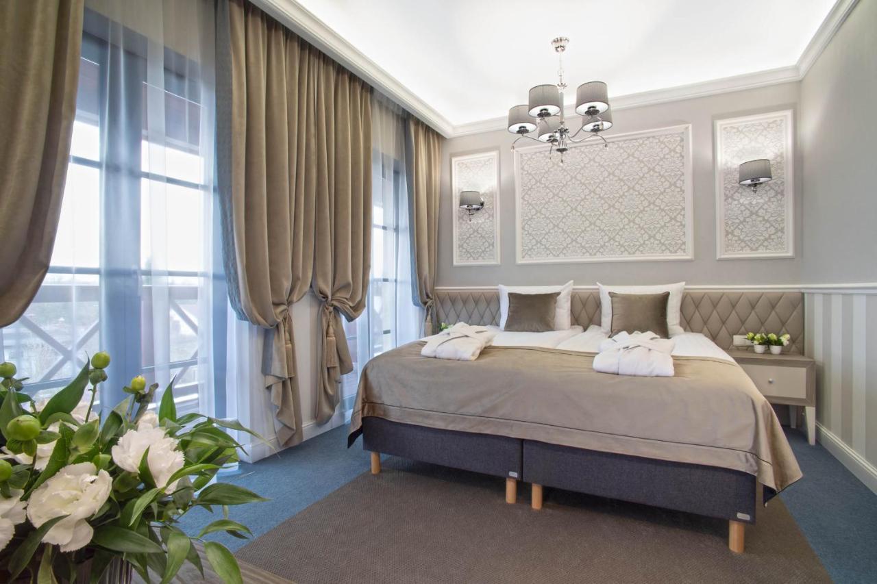 Boutique Odyseja & Spa Ciechocinek Exterior photo A bedroom in the hotel